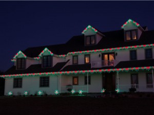 Red and Green Christmas Lights on Roofline                                                