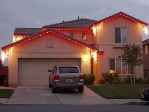 red  christmas lights on roofline                                            